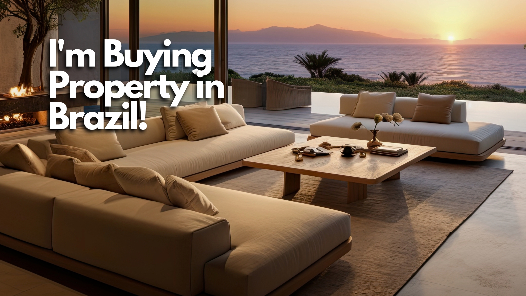 Breathtaking view from a Brazilian villa living room with floor-to-ceiling sliding windows overlooking the ocean and a sunset behind distant mountains.